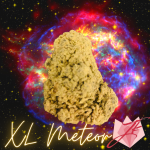 meteor moonrock in front of galaxy